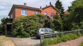 Ansicht von der Straße - Mehrfamilienhaus, Wohnhaus zum Kaufen in Schwarzenbek