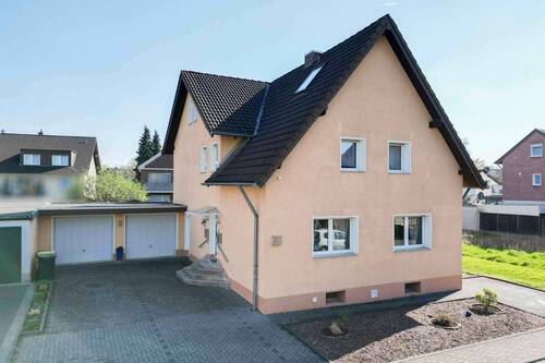 Außenansicht - Erbbaurecht: Top gepflegtes Zweifamilienhaus mit vielseitigem Nutzungspotenzial
