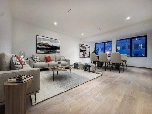 Wohnzimmer - Einziehen & Wohlfühlen: Erstklassige Neubauwohnung mit vielen Extras