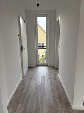Wohnung OG mit Balkon - 