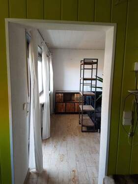 Blick Küche in das Wohnzi - 