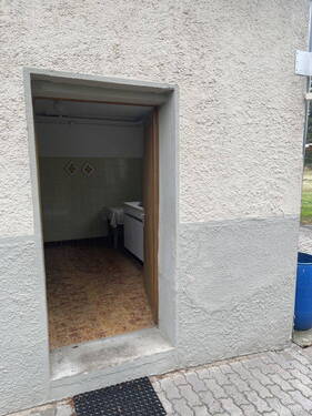 Hausansicht Nebeneingang - Einfamilienhaus mit 120,00 m² in Freden zum Kaufen