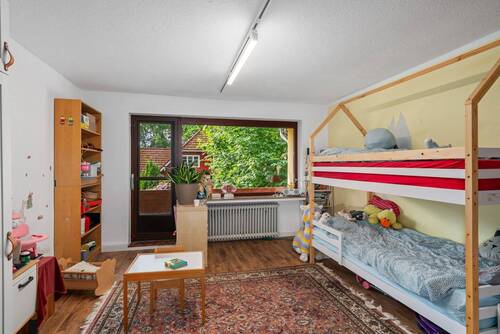 Einliegerwohnung: Zimmer 1 im Obergeschoss (19,70 m²) - 