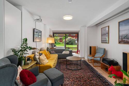 Wohnzimmer im Erdgeschoss (37,57 m²) - 