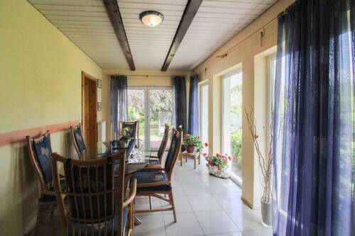 Wintergarten - Einfamilienhaus mit 156,20 m&sup2; in Timmaspe zum Kaufen