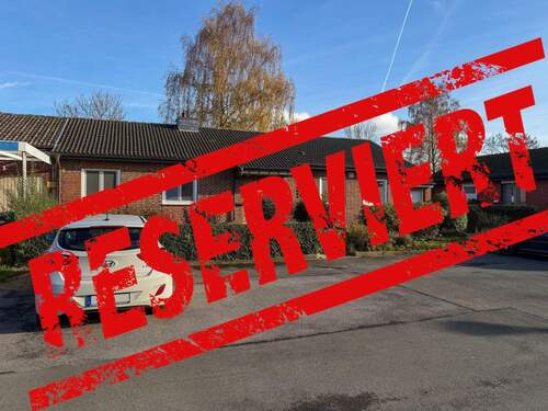 Frontansicht - Attraktiver Bungalow mit Garage, gepflegtem Garten und Kaufgrundstück in ruhiger Wohnlage