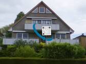 Straßenansicht - Moderne 2-Zimmer-Erdgeschosswohnung mit Carport in Pinneberg