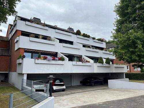 Rückansicht mit Terrassen - 2 Zimmer Etagenwohnung zum Kaufen in Delmenhorst