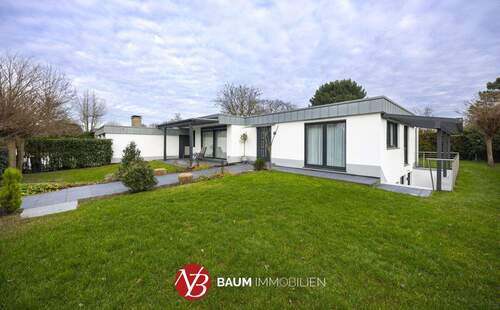 Frontansicht - Energieeffizientes Wohnjuwel in Top-Lage! Kernsanierter Bungalow am Strümper Berg