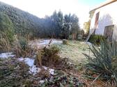 Garten und Garage am Haus - 