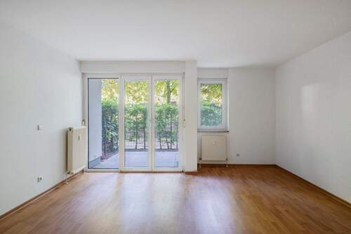 WohnzimmerWeitere Ansicht Wohnzimmer - Helle Erdgeschosswohnung mit Terrasse