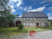 Bild 1 - Sanierungswürdiger Dreiseithof mit angrenzender Weidefläche und fünf Ferienbungalows