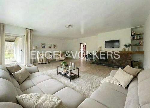 Einrichtungsbeispiel Wohnzimmer - Einfamilienhaus mit 213,00 m&sup2; in Usingen zum Kaufen