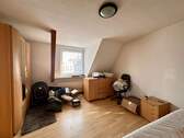 Schlafzimmer 1 mit Dachgaube - 