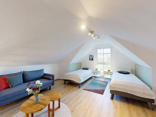 Wohn- und Schlafbereich im ausgebauten Dachgeschoss - 