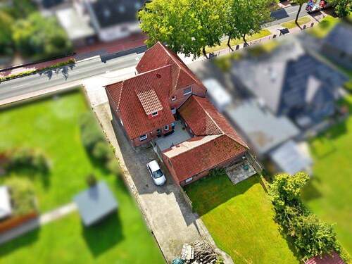 Luftaufnahme - 8 Zimmer Mehrfamilienhaus, Wohnhaus zum Kaufen in Detern