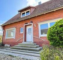 Einfamilienhaus mit Einliegerwohnung in Neuenhaus; + Baugrundstück-Potenzial