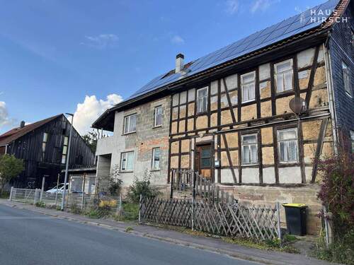 Frontansicht Haus - 1 Zimmer Einfamilienhaus zum Kaufen in Hildburghausen