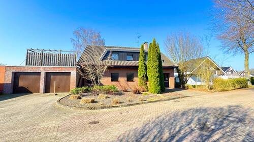 Bild 1 - Zweiparteienhaus mit Garten und Doppelgarage in Neuenhaus