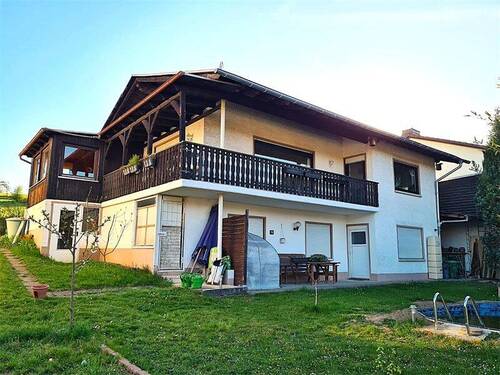 Eckansicht Gartenansicht - Einfamilienhaus mit 136,00 m² in Niedererbach zum Kaufen