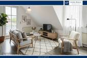 Wohnzimmer - Charmante Dachgeschosswohnung mit hoher Lebensqualität