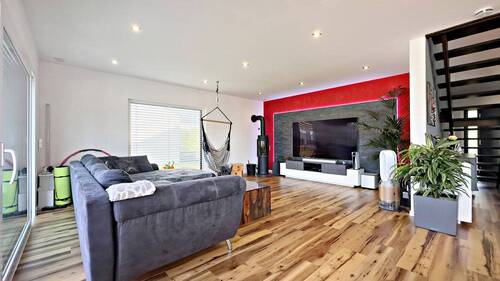 Wohnzimmer - Einfamilienhaus mit 210,00 m² in Deining zum Kaufen