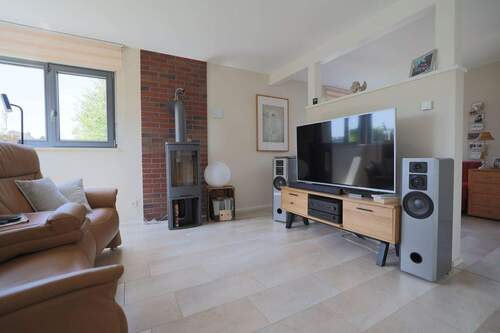 Gemütlicher Wohnbereich mit Kamin - 