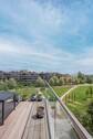 Blick von der Loggia in den Park nach Westen - Front Row am Gleisdreieckpark: Beeindruckende Wohnung mit Panoramablick