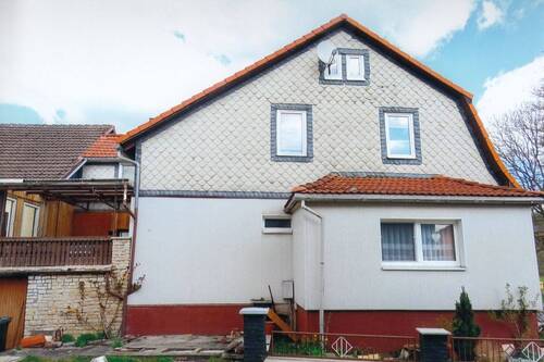 Hausansicht Giebelseite - Mehrfamilienhaus, Wohnhaus mit 170,00 m&sup2; in Frankenblick zum Kaufen