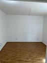 Schlafzimmer mit PVC-Bodenbelag in Holzoptik - 4 Zimmer Etagenwohnung in Bad Vilbel