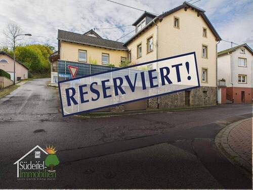 Bild 1 - Zweifamilienhaus mit schöner Terrasse und mit Doppelgarage. L- Vianden nur 5 min!