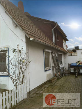 Seitenansicht zum Stellplatz und Garage - Einfamilienhaus mit 173,00 m² in Petershagen zum Kaufen