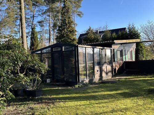 seitliche Ansicht mit Wintergarten - Investieren Sie in Ihre Freizeit! (JS-1020-214)