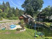 Kinderspielbereich und Gartenhaus - 4 Zimmer Mehrfamilienhaus, Wohnhaus zum Kaufen in Herrischried-Wehrhalden