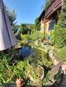 Gartenterrasse mit Teich - 9 Zimmer Einfamilienhaus in Kleines Wiesental