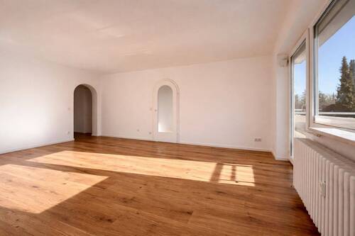 Wohnzimmer mit Eichenparkett - 