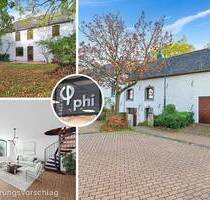 PHI AACHEN - Geräumiger Wohntraum mit Sonnengarten und Garage in begehrter Lage von Laurensberg!