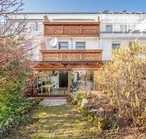 AIGNER - Reihenmittelhaus mit Dachterrasse, Südbalkon und Garten in Kirchheim