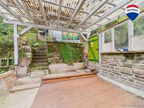 RE/MAX Immobilien DeLux Einfamilienhaus Mettlach-Dreisbach Terrasse - 