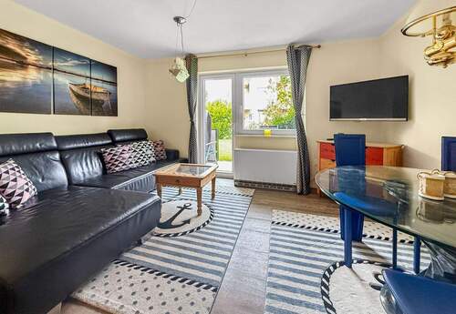 Wohnzimmer - Terrassenwohnung mit 58,60 m&sup2; in Sankt Peter Ording zum Kaufen