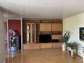 Wohnzimmer mit Kachelofen - Bungalow mit 194,00 m&sup2; in Königsbrunn zum Kaufen