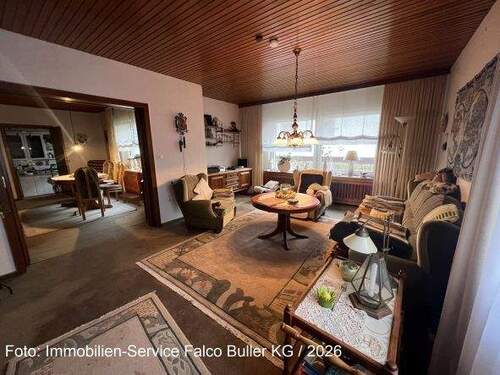 Wohnzimmer - 8 Zimmer Einfamilienhaus zum Kaufen in Lübbecke