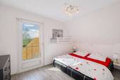 Schlafzimmer mit Balkon - 