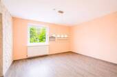 Schlafzimmer - Mehrfamilienhaus, Wohnhaus mit 124,00 m&sup2; in Nienburg (Weser) zum Kaufen