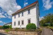 Straßenansicht - 6 Zimmer Mehrfamilienhaus, Wohnhaus zum Kaufen in Langelsheim