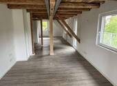 Eingangsbereich mit Blick in den Wohn-/Essbereich - 