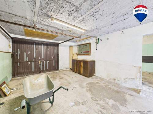 RE/MAX Immobilien DeLux Einfamilienhaus Nalbach Garage - 