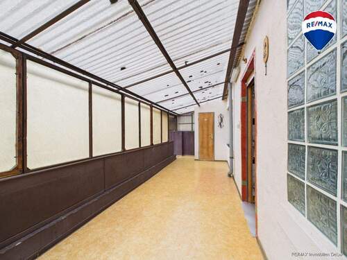 RE/MAX Immobilien DeLux Einfamilienhaus Nalbach Wintergarten - 