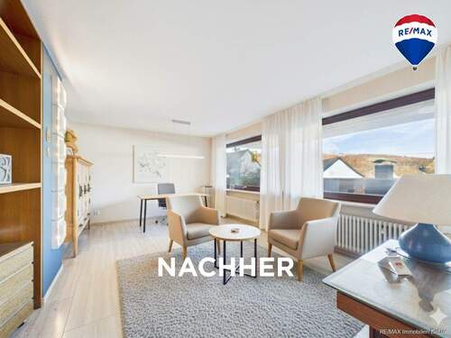 RE/MAX Immobilien DeLux Wohn-Geschäftshaus Merzig Wohnzimmer nachher - 