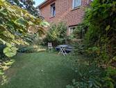 Hausansicht vom Garten - 4 Zimmer Etagenwohnung zum Kaufen in Vordorf